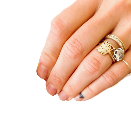 Megan Gray wearing here 10 year anniversary ring in 14k gold MMX - MMXX hand drawn made and 3d printed luxury gift and unique one of a kind gift ring and heirloom 