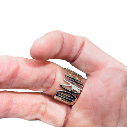 Heirloom for Hector Osunsa Hauntology in 14k gold hand drawn 3d printed text large width band wrapped around a finger Jewelry by ambie stapleton 